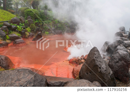 Chinoike Jigoku Blood hell pond with white steam in Beppu, japan Chinoike Jigoku Blood hell pond with white steam in Beppu, japan 117910256