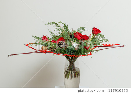 Christmas composition of fresh flowers 117910353