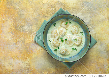 ravioli in cream sauce, spices and herbs, top view, no people, ravioli in cream sauce, spices and herbs, top view, no people, 117910604