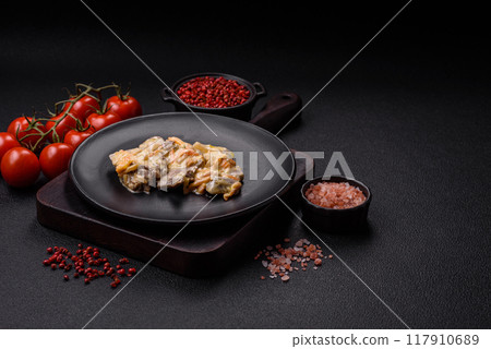 Delicious boiled beef or pork tongue sliced with carrots, onions, sour cream 117910689