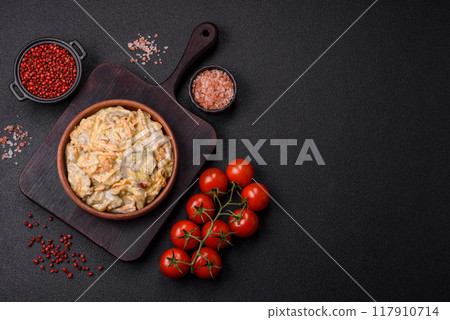 Delicious boiled beef or pork tongue sliced with carrots, onions, sour cream Delicious boiled beef or pork tongue sliced with carrots, onions, sour cream 117910714