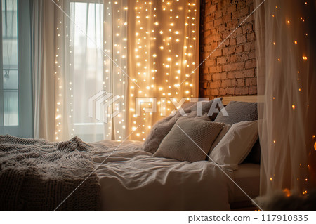 Cozy bedroom with warm string lights and soft bedding, whimsical atmosphere at night 117910835