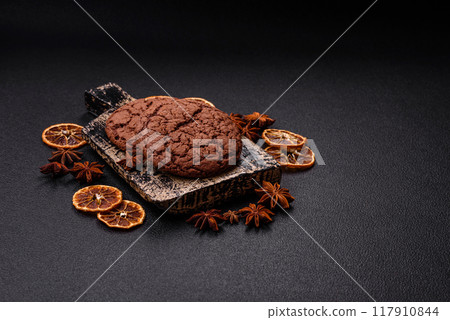 Delicious crispy round oatmeal cookies with chocolate 117910844