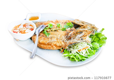 Top view of Deep-Fried marinated snapper fish with fish sauce, focus selective 117910877