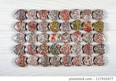 Heart-Shaped Beauty: 40 Leopard Skin Jasper Stones Arranged in Perfect Harmony - Discover the Allure of Natural Patterns in Gemstone Form. Heart-Shaped Beauty: 40 Leopard Skin Jasper Stones Arranged in Perfect Harmony - Discover the Allure of Natural Patterns in Gemstone Form. 117910977