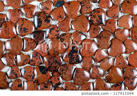 Love Forged in Fire: Mahogany Obsidian Hearts Showcase Volcanic Beauty | Gemstone Flat Lay for Earthy Jewelry Design and Crystal Healing. Love Forged in Fire: Mahogany Obsidian Hearts Showcase Volcanic Beauty | Gemstone Flat Lay for Earthy Jewelry Design and Crystal Healing. 117911094