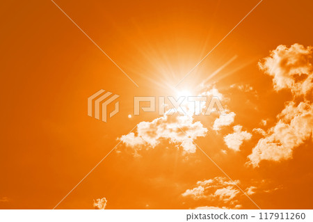 Hot weather. Vivid blue sky with bright sun and scattered white clouds Hot weather. Vivid blue sky with bright sun and scattered white clouds 117911260