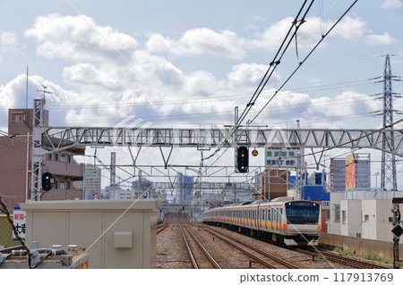 Rapid train bound for Tokyo approaching Koenji Station (center) Rapid train bound for Tokyo approaching Koenji Station (center) 117913769