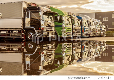 Large trucks parked in a row Large trucks parked in a row 117913818