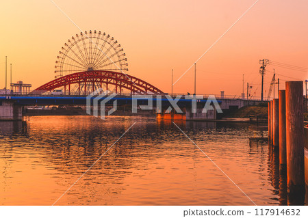 Nagoya city, Nakagawa Bridge and Ferris wheel at Port of Nagoya Aquarium at sunrise Nagoya city, Nakagawa Bridge and Ferris wheel at Port of Nagoya Aquarium at sunrise 117914632
