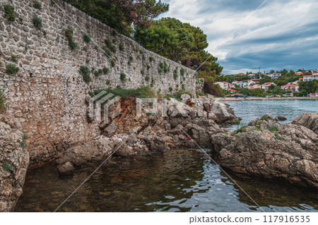 Krk Croatia 26.06.24 The walls of the Frankopan fortress from the sea side Krk Croatia 26.06.24 The walls of the Frankopan fortress from the sea side 117916535