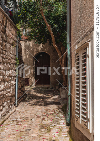 Krk Croatia 26.06.24A small street to a private house in the old town Krk Croatia 26.06.24A small street to a private house in the old town 117916557