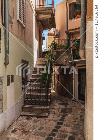Krk Croatia 26.06.24 A small yard with steps to a private house 117916564