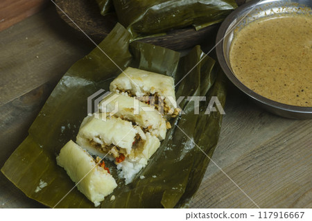 Lontong oncom, a traditional Indonesian dish Lontong oncom, a traditional Indonesian dish 117916667