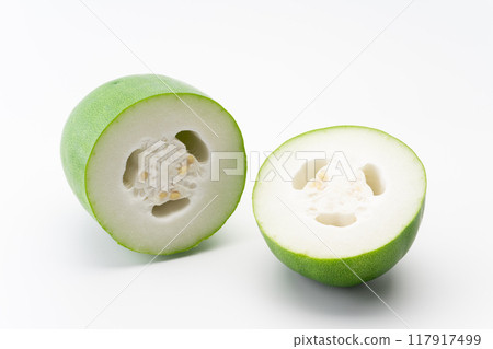 Winter melon cut in half 117917499