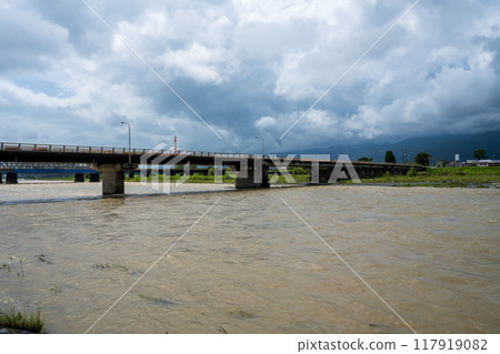 River and sky swollen by the typhoon - Sakawa River during the typhoon River and sky swollen by the typhoon - Sakawa River during the typhoon 117919082