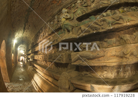 The balcony is curved like a tunnel. It is nearly 100 meters long on each side and decorated with high relief paintings related to the Buddha Jataka at Wat Shitetaung praya.Located at Mrauk-U,Myanmar. The balcony is curved like a tunnel. It is nearly 100 meters long on each side and decorated with high relief paintings related to the Buddha Jataka at Wat Shitetaung praya.Located at Mrauk-U,Myanmar. 117919228