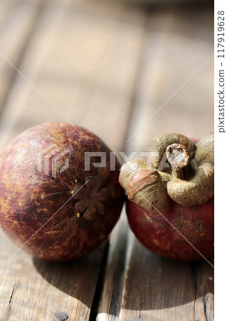 Petals from the bottom of a Thai mangosteen, a tropical fruit 117919628