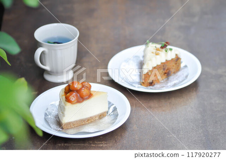 carrot cake with cream and walnut topping ,caramel macadamia cheesecake and butterfly pea tea carrot cake with cream and walnut topping ,caramel macadamia cheesecake and butterfly pea tea 117920277