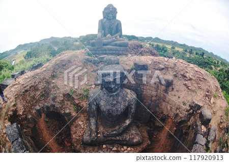 Ancient Buddha statue at Latyar Pisi Pagoda.A pagoda where you can actually go inside. This pagoda was also well-preserved with no restorations made. Located at Mrauk-U city in Myanmar. 117920913