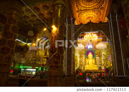 Phra Mahamuni is a replica of Phra Mahamuni at Mandalay. This one is enshrined at Wat Mahamuni Phraya. It is located on the Rakhine State, Myanmar. Phra Mahamuni is a replica of Phra Mahamuni at Mandalay. This one is enshrined at Wat Mahamuni Phraya. It is located on the Rakhine State, Myanmar. 117921513