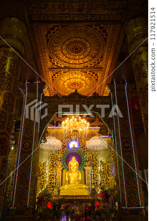 Phra Mahamuni is a replica of Phra Mahamuni at Mandalay. This one is enshrined at Wat Mahamuni Phraya. It is located on the Rakhine State, Myanmar. Phra Mahamuni is a replica of Phra Mahamuni at Mandalay. This one is enshrined at Wat Mahamuni Phraya. It is located on the Rakhine State, Myanmar. 117921514