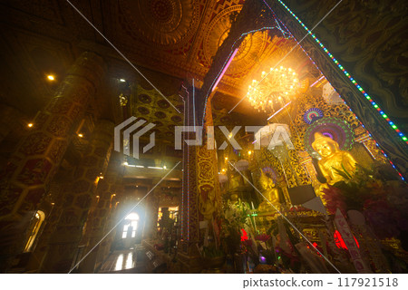 Large golden seated Buddha image is the main Buddha image and Phra Mahamuni in the Mahamuni Phrya Temple Church. It is located on the Rakhine State.Myanmar. Large golden seated Buddha image is the main Buddha image and Phra Mahamuni in the Mahamuni Phrya Temple Church. It is located on the Rakhine State.Myanmar. 117921518