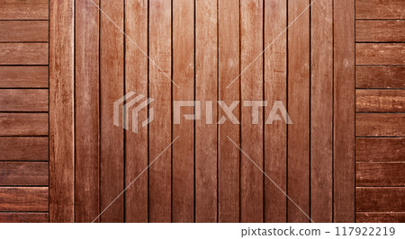 Dark wood background, brown wood texture, natural wood background with light and shadow. Dark wood background, brown wood texture, natural wood background with light and shadow. 117922219