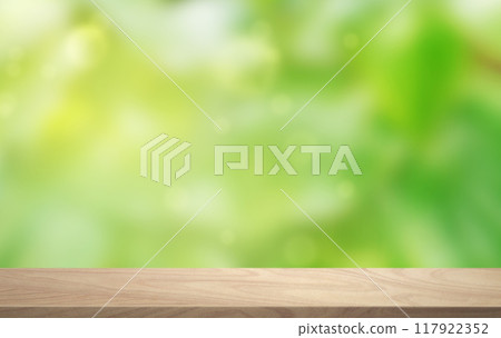 Empty wooden table in the backyard blurred background. Empty wooden table in the backyard blurred background. 117922352