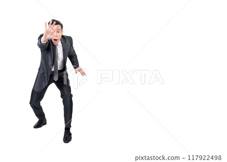 Funny businessman showing stop gesture. White background. 117922498
