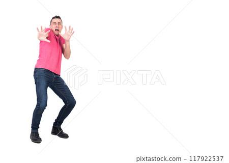 Horrified man screaming and protecting from danger 117922537