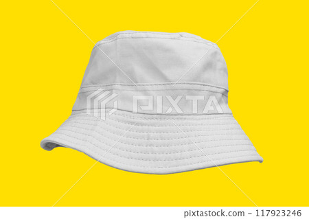 white bucket hat isolated on yellow white bucket hat isolated on yellow 117923246