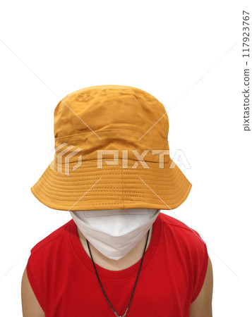 Boy wearing a brown bucket hat Isolated on a white background Boy wearing a brown bucket hat Isolated on a white background 117923767