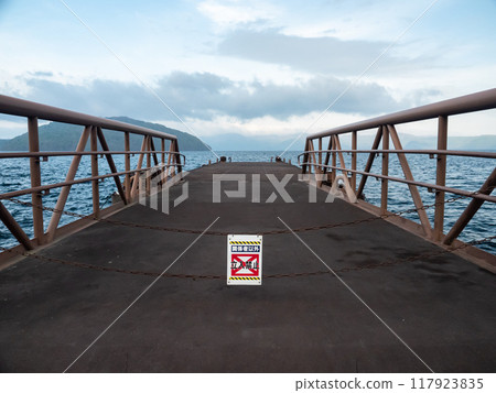 No trespassing sign on the pier 117923835