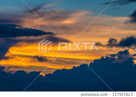 Summer sky over Yokohama cityscape in Japan. The Japanese archipelago continues to be extremely hot... Huge clouds hang in the sky... = August 25, from Yokohama 117925823