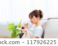 Woman in loungewear relaxing on sofa / Holiday morning / Relaxing 117926225