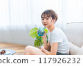 Woman in loungewear relaxing on sofa / Holiday morning / Relaxing 117926232