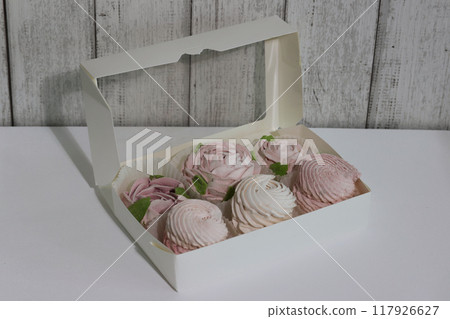 Homemade marshmallows in an open box. Marshmallow flowers. Homemade marshmallows in an open box. Marshmallow flowers. 117926627