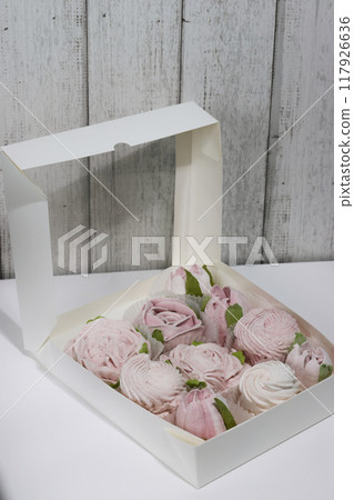 Homemade marshmallows in an open box. Marshmallow flowers. Homemade marshmallows in an open box. Marshmallow flowers. 117926636