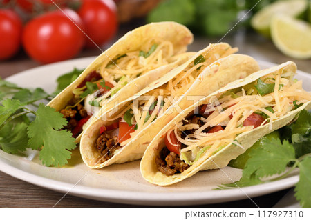 Taco with ground beef, cabbage and cheese 117927310