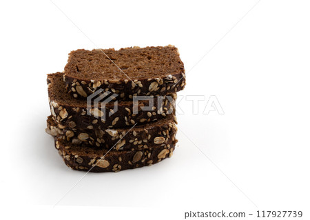 slices of rye bread on white background, side view 117927739