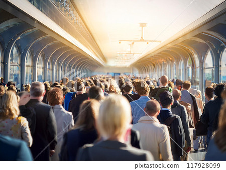 Businessmen and businesswomen commuting to work 117928099