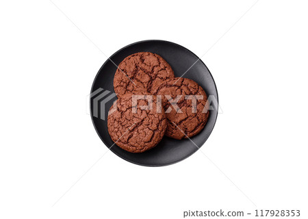 Delicious crispy round oatmeal cookies with chocolate 117928353