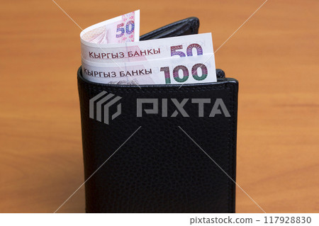 Old Kyrgyz som in the black wallet Old Kyrgyz som in the black wallet 117928830