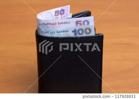 Old Kyrgyz som in the black wallet Old Kyrgyz som in the black wallet 117928831