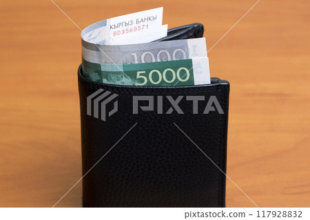Kyrgyz som in the black wallet 117928832