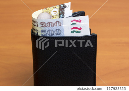 Tajikistani somoni in the black wallet Tajikistani somoni in the black wallet 117928833