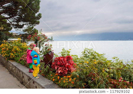 Kids walking in Montreux, Switzerland Kids walking in Montreux, Switzerland 117929102