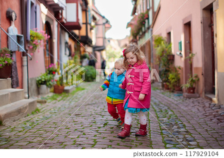 Kids in historical city center in France 117929104