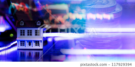 House model on the background of the stock market. The concept of buying a house.Real estate concept 117929394